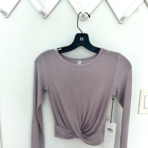Gym wear top from Alo Yoga.